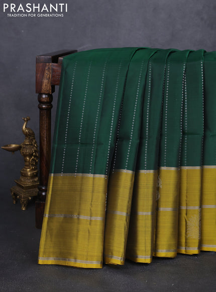 Kanchipuram soft silk saree bottle green and yellow with allover silver zari stripes pattern and long zari woven border