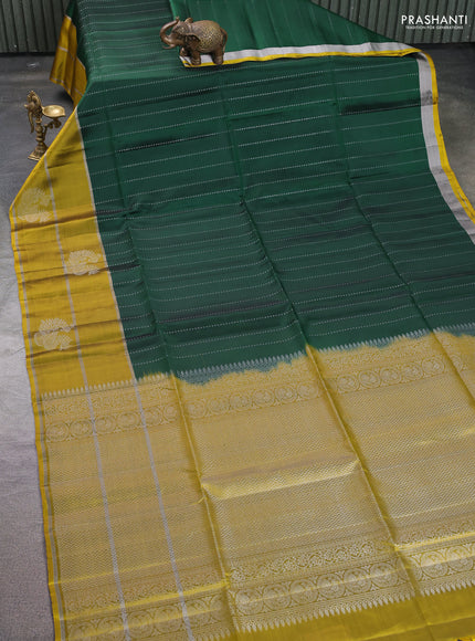 Kanchipuram soft silk saree bottle green and yellow with allover silver zari stripes pattern and long zari woven border