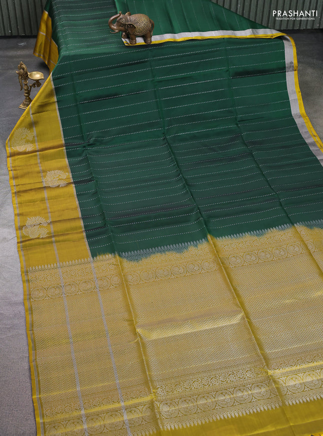 Kanchipuram soft silk saree bottle green and yellow with allover silver zari stripes pattern and long zari woven border