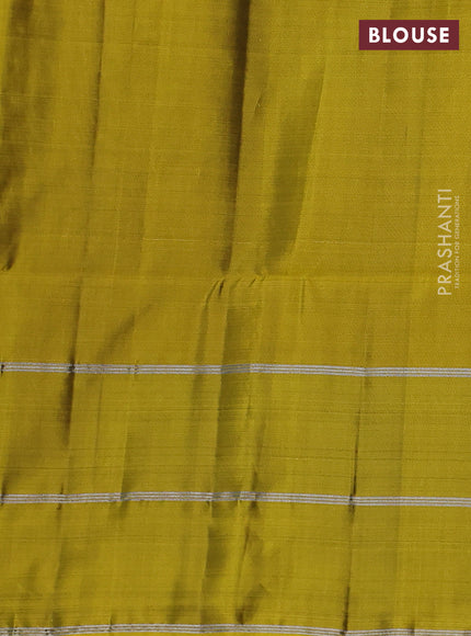 Kanchipuram soft silk saree bottle green and yellow with allover silver zari stripes pattern and long zari woven border