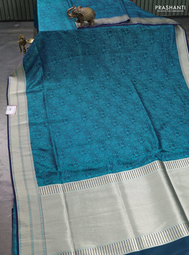 Banarasi semi katan silk saree navy blue with allover floral self emboss and zari woven border