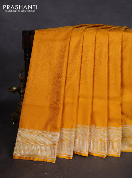 Banarasi semi katan silk saree yellow with allover floral self emboss and zari woven border