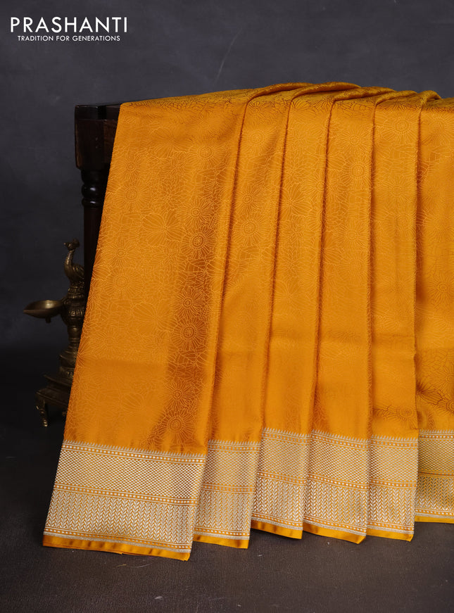 Banarasi semi katan silk saree yellow with allover floral self emboss and zari woven border