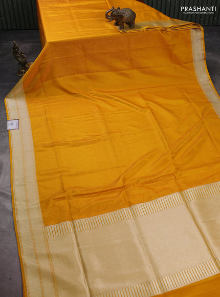 Banarasi semi katan silk saree yellow with allover floral self emboss and zari woven border