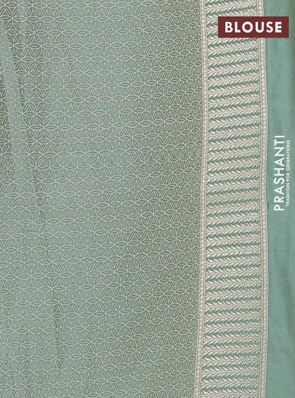 Banarasi semi katan silk saree teal shade with allover floral self emboss and zari woven border