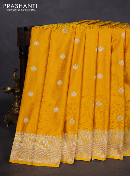 Banarasi semi katan silk saree yellow with allover self emboss & zari buttas and zari woven border