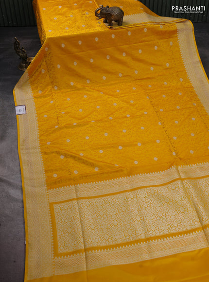 Banarasi semi katan silk saree yellow with allover self emboss & zari buttas and zari woven border