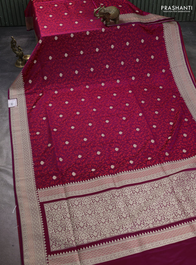 Banarasi semi katan silk saree dark megenta pink with allover self emboss & zari buttas and zari woven border