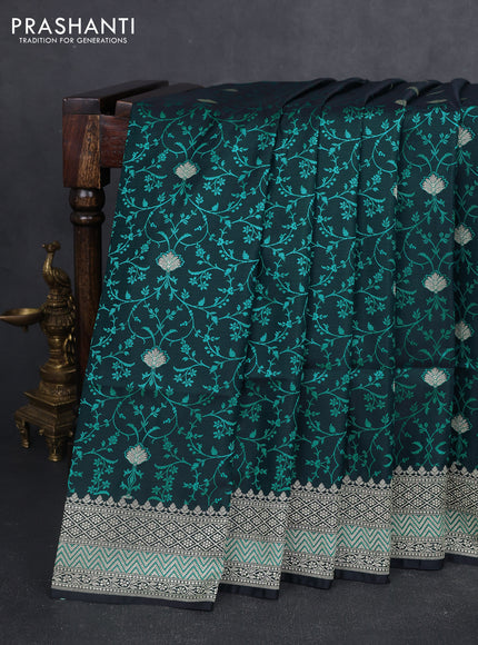 Banarasi semi katan silk saree black and teal green with allover self emboss & zari buttas and zari woven border