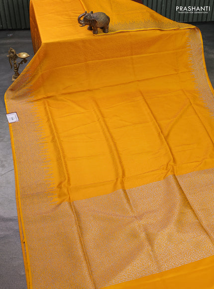 Banarasi semi katan silk saree mustard yellow with allover self emboss and zari woven border