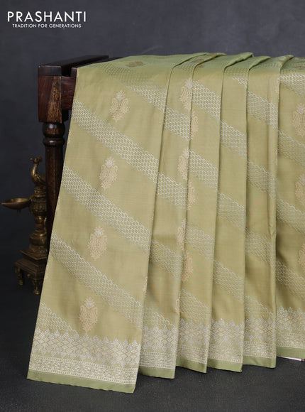 Banarasi semi katan silk saree pastel green with allover zari weaves & thread wiven buttas and zari woven border