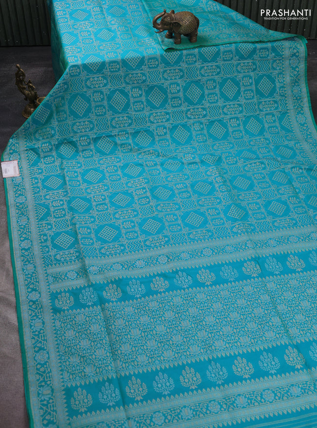 Banarasi semi katan silk saree teal blue with allover silver & gold zari woven buttas and zari woven border