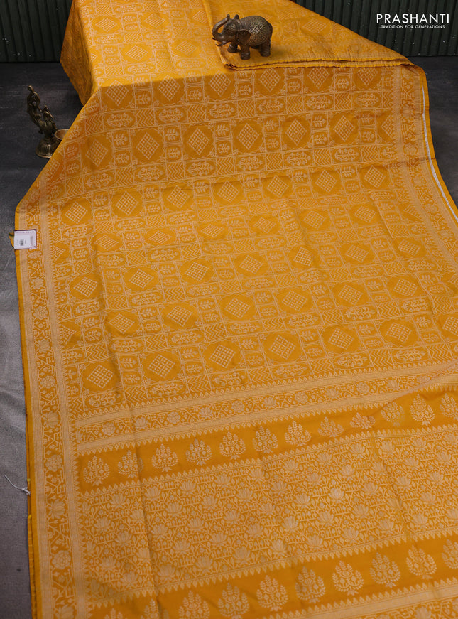 Banarasi semi katan silk saree mustard yellow with allover silver & gold zari woven buttas and zari woven border