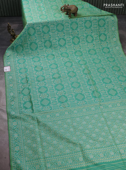 Banarasi semi katan silk saree pastel green with allover silver & gold zari woven buttas and zari woven border