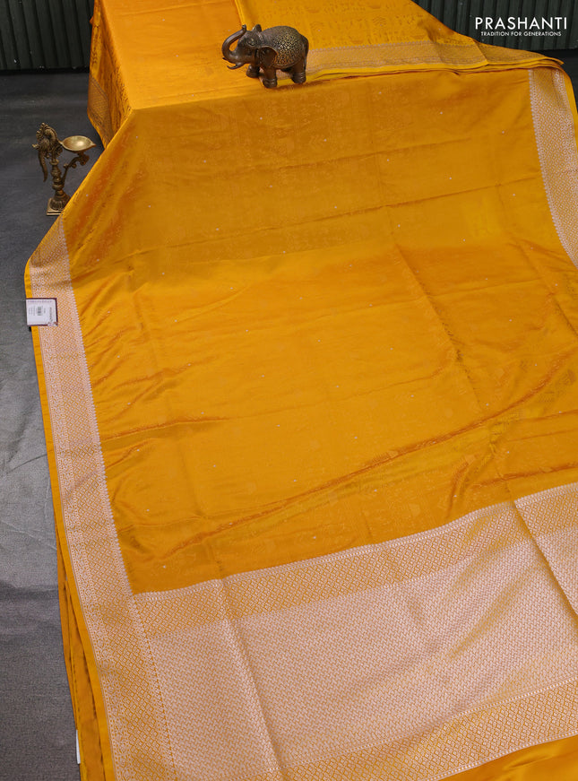 Banarasi semi katan silk saree yellow with allover self emboss and copper zari woven border