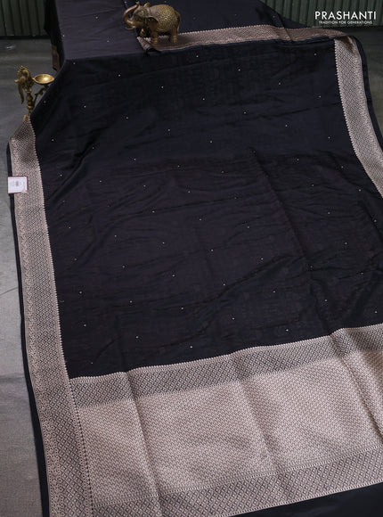 Banarasi semi katan silk saree black with allover self emboss and copper zari woven border