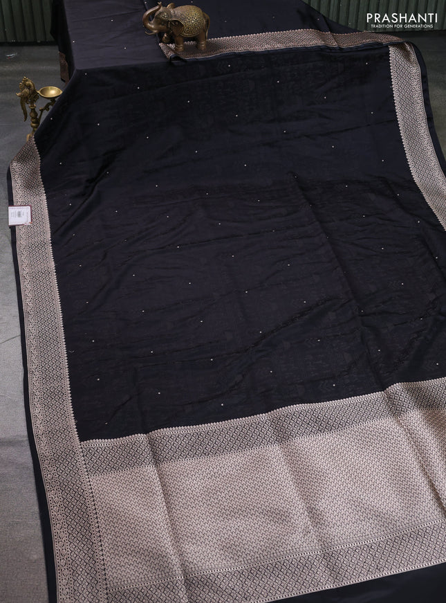 Banarasi semi katan silk saree black with allover self emboss and copper zari woven border