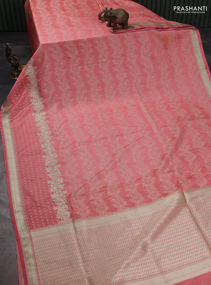 Banarasi semi katan silk saree peach shade with allover floral self emboss & zari woven buttas and zari woven border