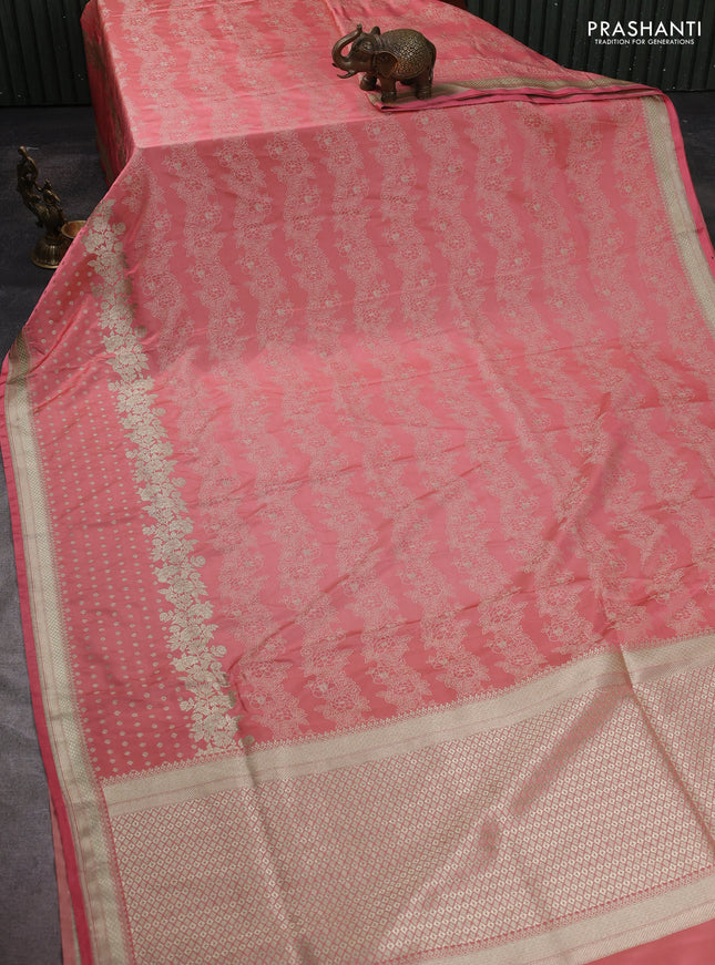 Banarasi semi katan silk saree peach shade with allover floral self emboss & zari woven buttas and zari woven border