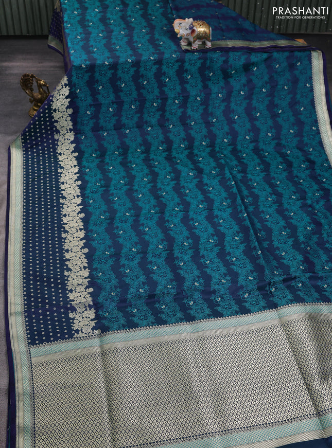Banarasi semi katan silk saree peacock blue with allover floral self emboss & zari woven buttas and zari woven border