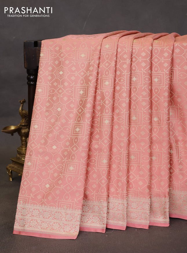 Banarasi semi katan silk saree peach shade with allover thread weaves & zari woven buttas and zari woven border