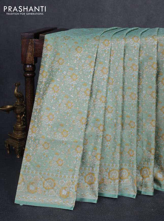 Banarasi semi katan silk saree pastel green with allover thread brocade weaves and thread woven border