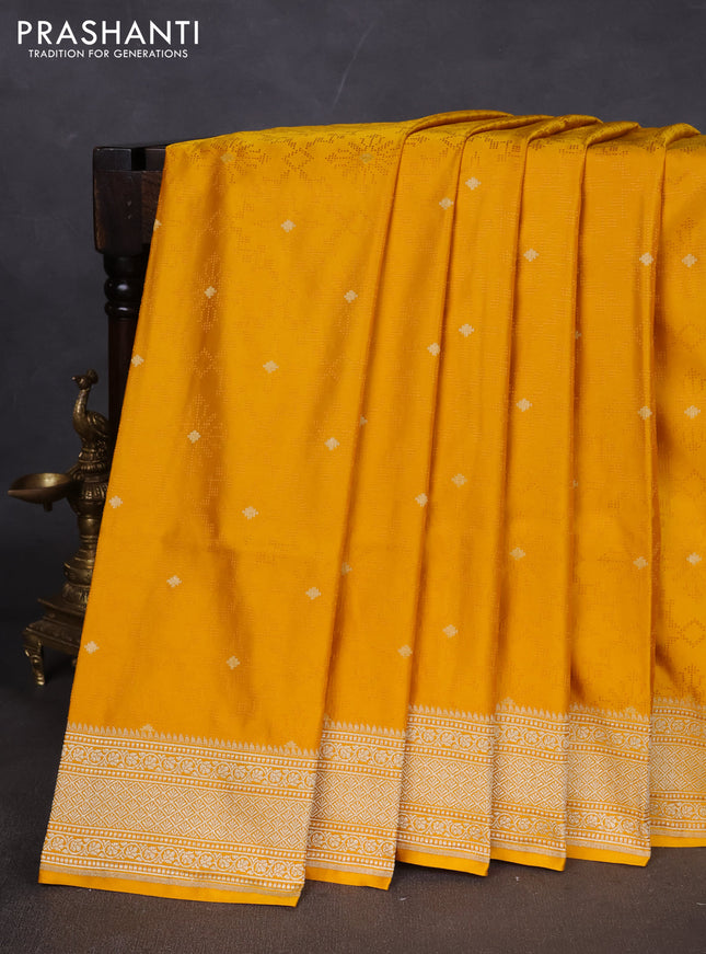 Banarasi semi katan silk saree yellow with allover self emboss & zari buttas and zari woven border
