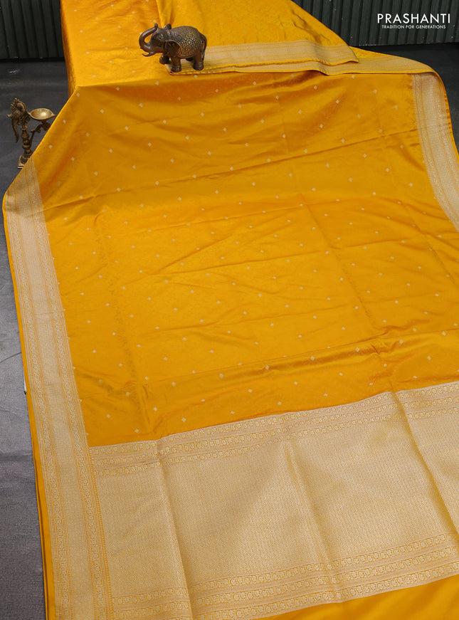 Banarasi semi katan silk saree yellow with allover self emboss & zari buttas and zari woven border