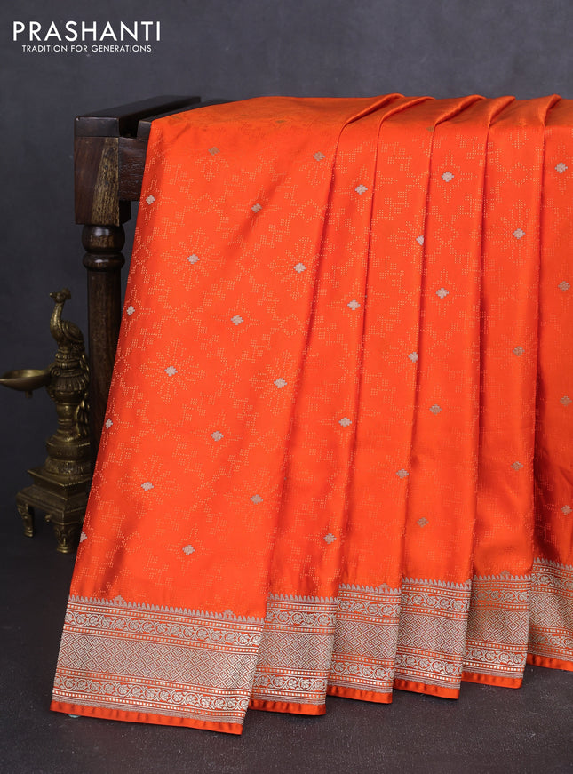 Banarasi semi katan silk saree orange with allover self emboss & zari buttas and zari woven border
