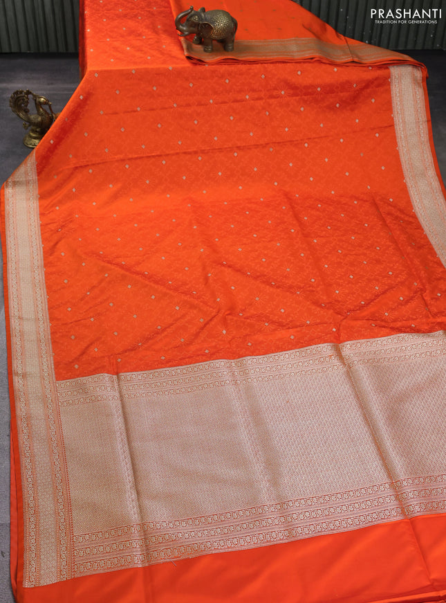 Banarasi semi katan silk saree orange with allover self emboss & zari buttas and zari woven border