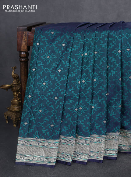 Banarasi semi katan silk saree dual shade of violet and teal green with allover self emboss & zari buttas and zari woven border