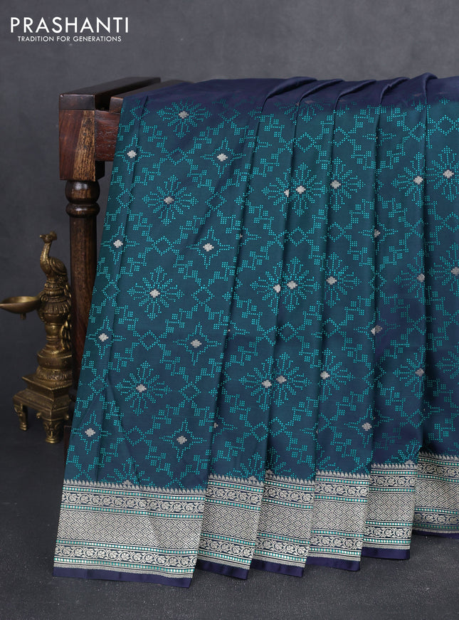 Banarasi semi katan silk saree dual shade of violet and teal green with allover self emboss & zari buttas and zari woven border