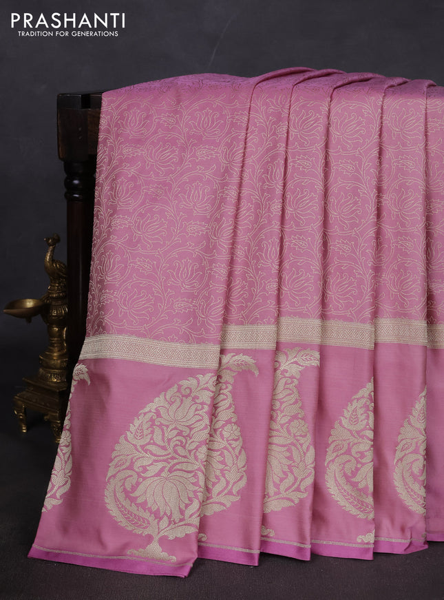 Banarasi semi katan silk saree mauve pink with allover self emboss and zari woven butta border