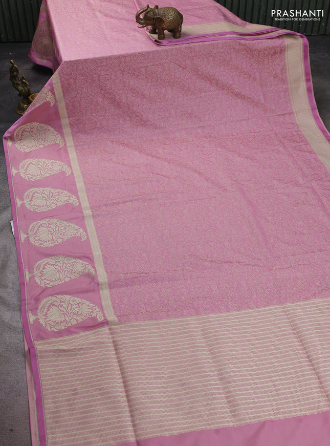 Banarasi semi katan silk saree mauve pink with allover self emboss and zari woven butta border