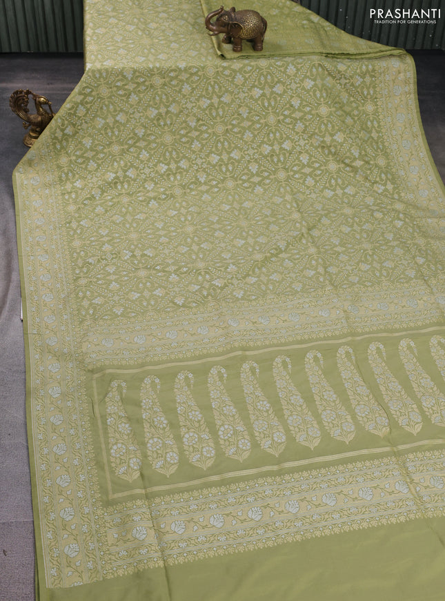 Banarasi semi katan silk saree pastel green with allover silver & gold zari weaves and zari woven border