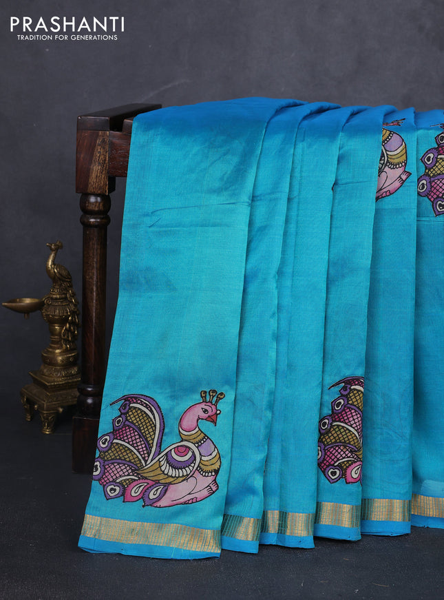 Silk cotton saree teal blue with kalamkari applique work and zari woven border