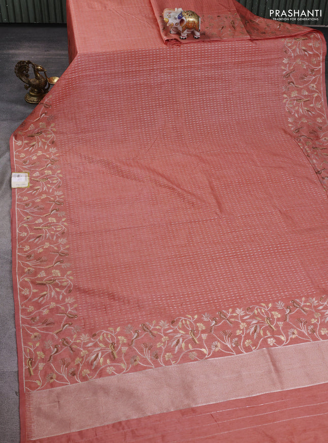 Art tussar saree peach orange with allover zari woven butta weaves and jamdhani style border