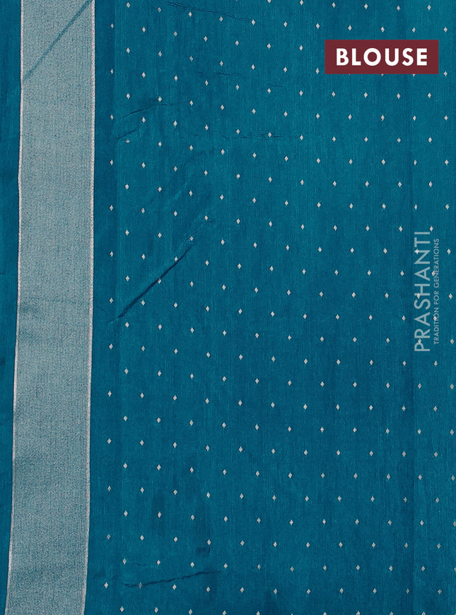 Art tussar saree peacock green with allover zari woven butta weaves and jamdhani style border