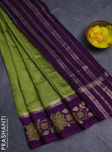 Semi chanderi saree green and violet with allover zari weaves and embroidery border