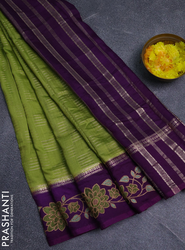Semi chanderi saree green and violet with allover zari weaves and embroidery border