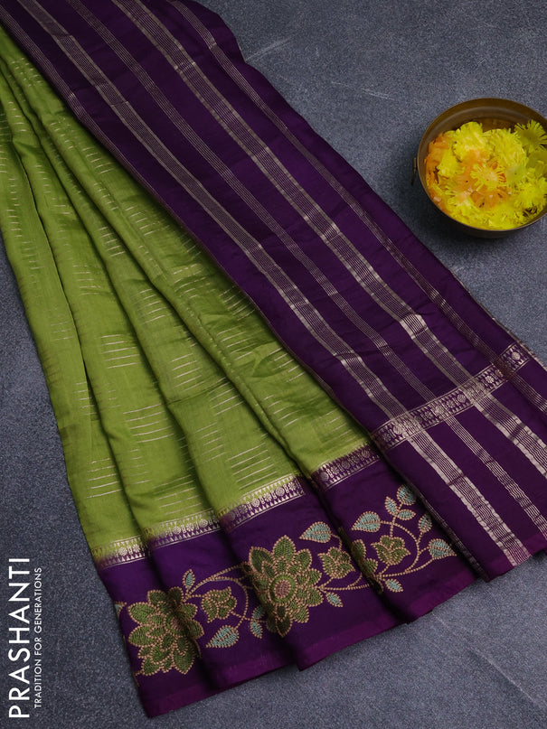 Semi chanderi saree green and violet with allover zari weaves and embroidery border
