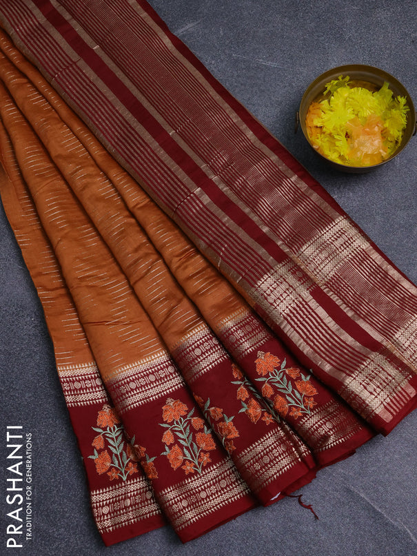 Semi chanderi saree rustic orange and maroon with allover zari weaves and embroidery zari border