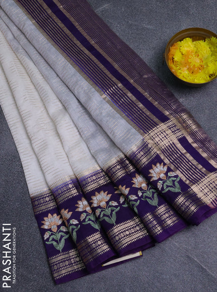 Semi chanderi saree off white and violet with allover zari weaves and embroidery zari border