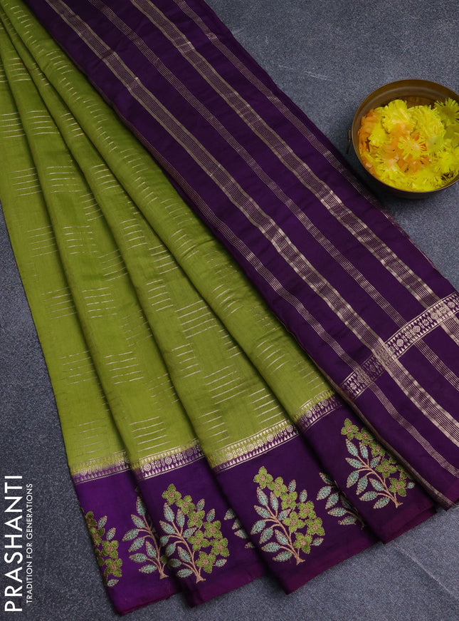 Semi chanderi saree light green and violet with allover zari weaves and embroidery border