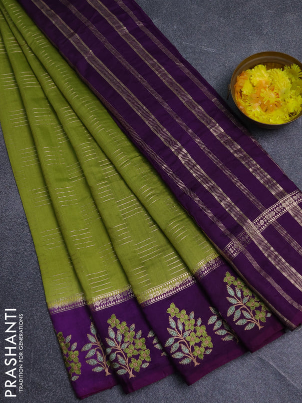 Semi chanderi saree light green and violet with allover zari weaves and embroidery border