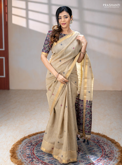 Linen cotton saree beige and purple blue with thread woven buttas and patola weaving pallu
