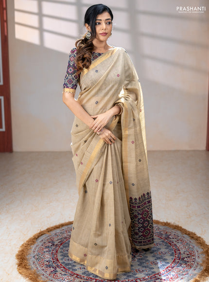 Linen cotton saree beige and purple blue with thread woven buttas and patola weaving pallu