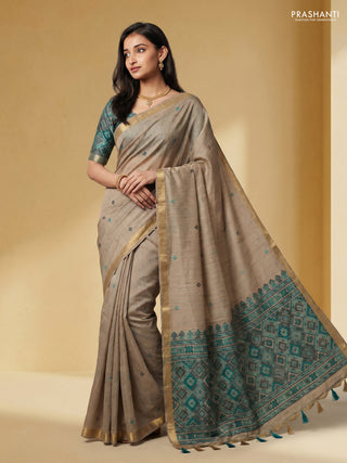 Linen cotton saree beige and teal green with thread woven buttas and patola weaving pallu
