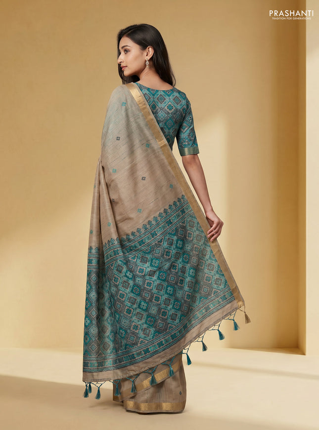 Linen cotton saree beige and teal green with thread woven buttas and patola weaving pallu