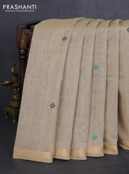 Linen cotton saree beige and teal green with thread woven buttas and patola weaving pallu